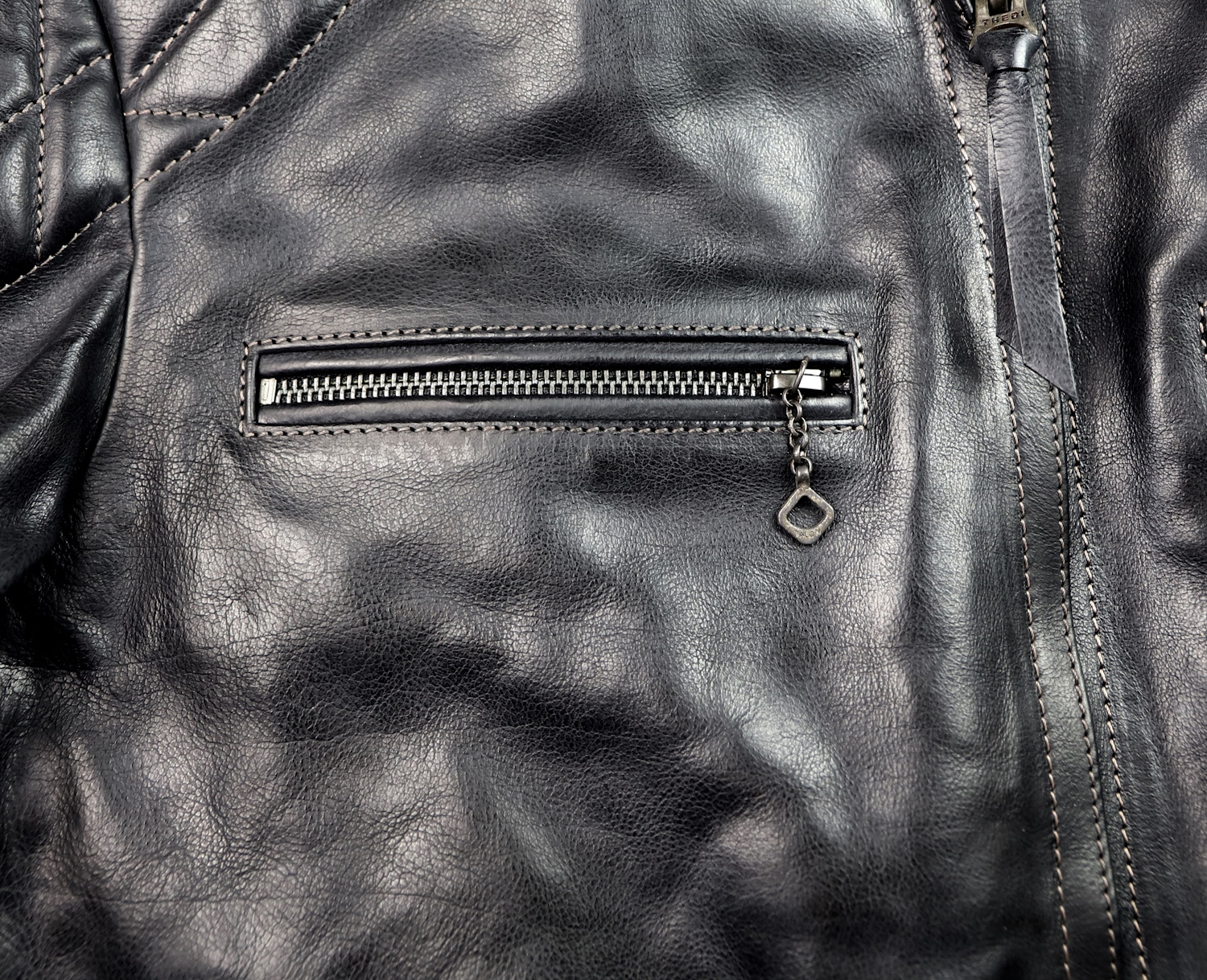 Thedi Phenix Black Buffalo M1K chest pocket.jpg